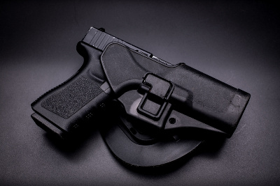 Pistol in a holster
